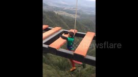 Overexcited man falls through steps on skywalk