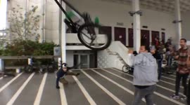 BMX bike lands on video camera, breaks lens