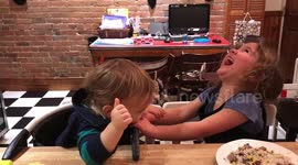 Young siblings re-enact 'Charlie Bit My Finger'