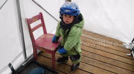 Baby's first time walking in ice skates