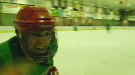 Senior Player Celebrates his hockey goal
