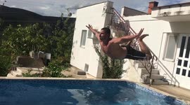 Man show painful jump on chest at swimming pool