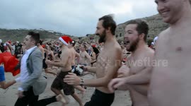 Christmas Swim at Sennen Cove in Cornwall