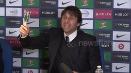 Chelsea boss Conte toast champagne with media to celebrate Christmas
