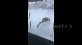 Boy dives into feet of snow in Erie, Pennsylvania