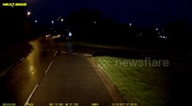 Dangerous driver overtakes the wrong way on a roundabout