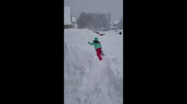 Daughter tripping into snow 4 feet of snow in Erie, PA record Lake Effect 2017