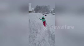 Newsflare Edit - Daughter tripping into snow 4 feet of snow in Erie, PA record Lake Effect 2017