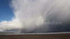Huge winter storm cell over Northern Ireland beach