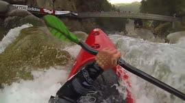 Kayaker 'cheats death' trapped under rocks in raging rapids