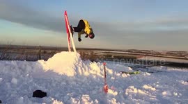 Teenagers make ski track in snowy Wiltshire countryside
