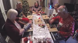 Funny game of Oven Mitt Challenge on Christmas Day with the parents