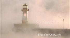 'Flames' in Sea Smoke on Lake Superior Lighthouse
