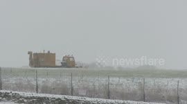 Snow ploughs clear Leeds Bradford Airport