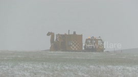 Snow ploughs clear Leeds Bradford Airport