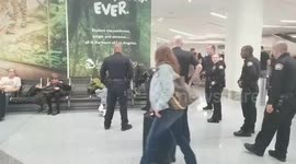 lax airport police on a 390 man at Los Angeles International Airport