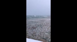 Ice balls in Lake Michigan at St. Joseph lighthouse pier @weatherchannel #ItsSoCold https://t.co/mwD1hYa7b8