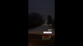 Multiple clips of snowy night, sledding, skating, waking in snow
