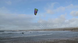 Kite surfers in Cornwall make the most of Storm Dylan