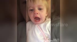 Newsflare Edit - Baby pulling funny faces at herself on the camera