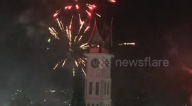 Indonesia landmark lit up by new year fireworks