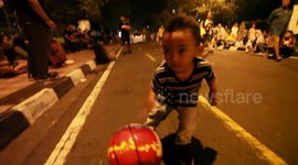 Little Boy Dribbling Basketball
