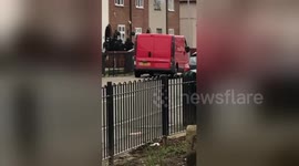 Scores of armed police swoop on east London home to arrest man