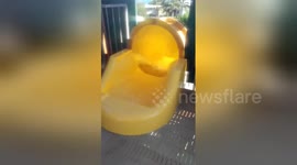 Newsflare Edit - Man uses clingfilm (sandwich wrap) to keep his phone dry on waterslide