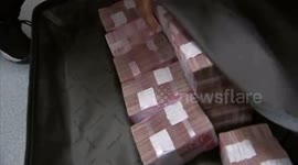 Woman brings over £850,000 worth of cash to purchase clothes in mall