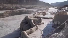 Frost and ice cover Hukou waterfall on Yellow River