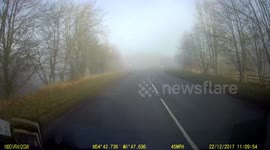 DASH CAM NEAR MISS IN FOG AT ROUNDABOUT