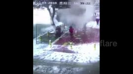 Schoolgirl submerged by snow falling from tree