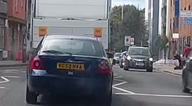 Mobility Scooter Cuts Through Traffic To Cross Road Caught On Dash Cam