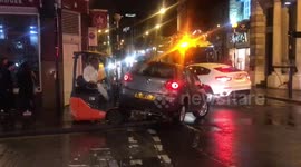 Forklift attempts to remove car from bollard