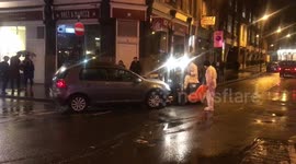 Forklift attempts to remove car from bell bollard