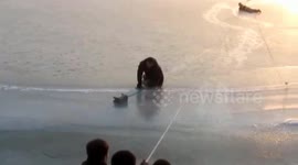 Firefighters rescue elderly man trapped on frozen river