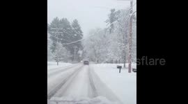 Driving on dangerous road in blizzard