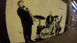 Banksy-style street art depicts Donald Trump as lead singer of