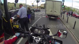 Bus crash next to a motorcycle