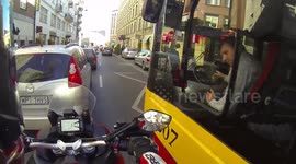 Bus driver stops and waits for the rider to pass easily (super nice)