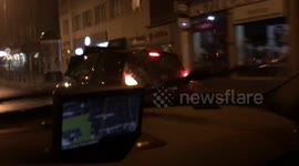 Car drives with an open bonnet