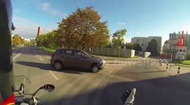 Driver cuts off a rider