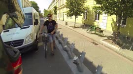 Idiot blocks a rider by surrounding him with bicycles