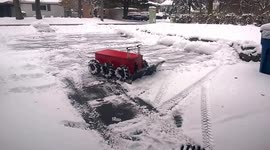 DIY robot snow plow cleans drive in 5 minutes
