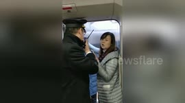 Woman refuses to leave train because her husband is not on it