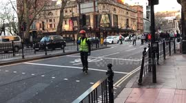 Parade of roller skaters through West End