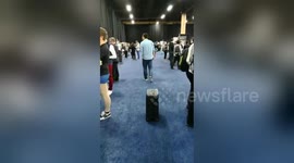 Self-driving luggage follows man around CES 2018