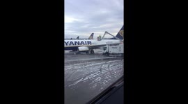 De-icing aircraft at Stansted Airport after the snowstorm.