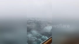 Footage shows cruise travelling through bomb cyclone