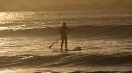Paddle boarders on the beach at Marazion #1